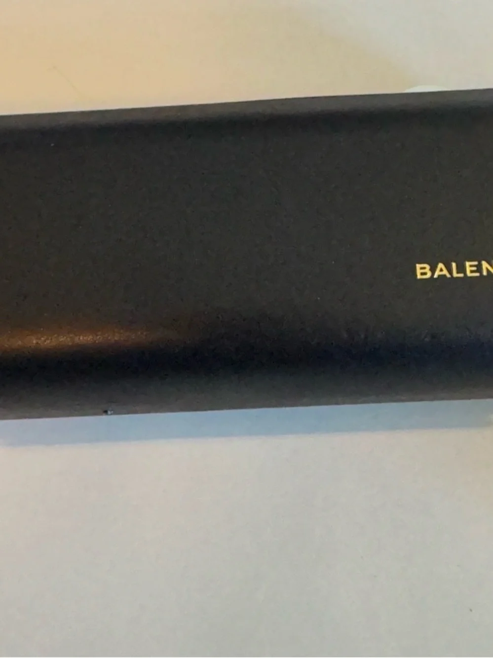 Balenciaga Black Cat-Eye Sunglasses with Brown Gradient Lenses.